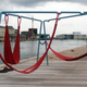 Illustration for article titled Adjustable Firehose Swings Turn the World Into a Playground